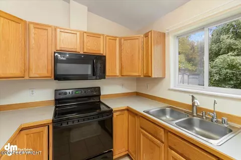 Kitchen - 2416 E 48th Ave, Anchorage, AK 99507 photo 2 of 2