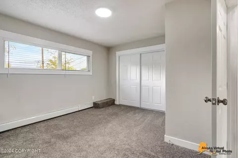 Bedroom - 6400 E 14th Ct, Anchorage, AK 99504 photo 5 of 13