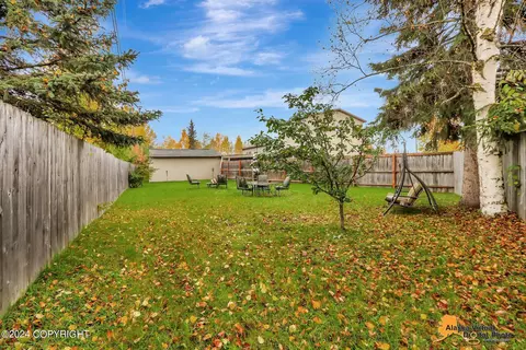 Exterior - 6400 E 14th Ct, Anchorage, AK 99504 photo 4 of 9