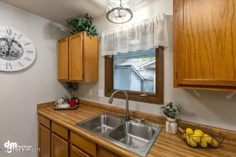 Kitchen - 3821 E 66th Ave, Anchorage, AK 99507 photo 3 of 4