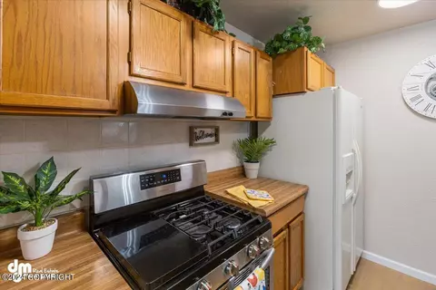 Kitchen - 3821 E 66th Ave, Anchorage, AK 99507 photo 2 of 4