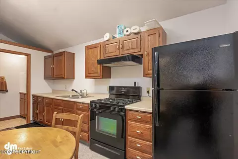 Kitchen - 17719 Blue Spruce Ln, Eagle River, AK 99577 photo 9 of 9
