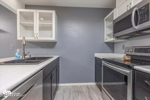Kitchen - 5018 E 43rd Ave # 6, Anchorage, AK 99508 photo 2 of 3