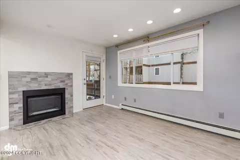 Living - 5018 E 43rd Ave # 6, Anchorage, AK 99508 photo 2 of 5