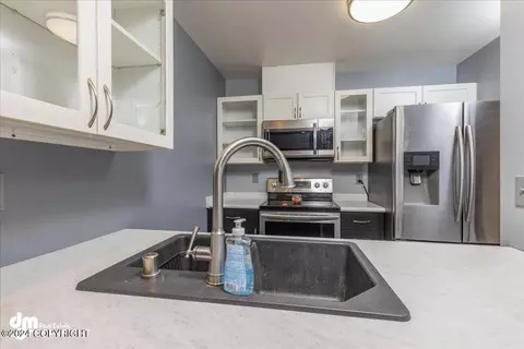 Kitchen - 5018 E 43rd Ave # 6, Anchorage, AK 99508 photo 1 of 3