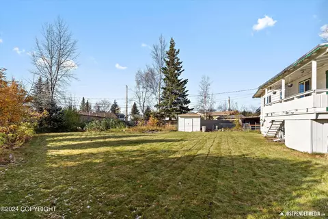 Exterior - 6412 E 14th Ct, Anchorage, AK 99504 photo 8 of 9