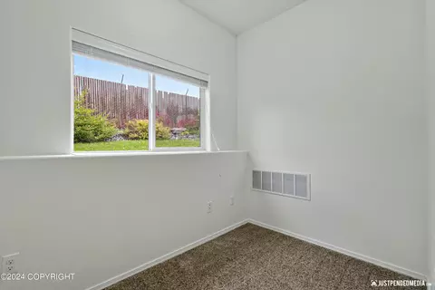 Bedroom - 11707 Aurora St # 2, Eagle River, AK 99577 photo 1 of 3