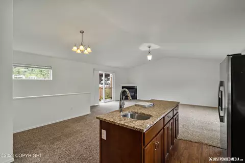 Living - 11707 Aurora St # 2, Eagle River, AK 99577 photo 4 of 4
