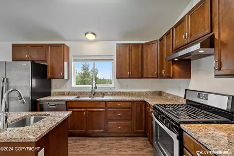 Kitchen - 11707 Aurora St # 2, Eagle River, AK 99577 photo 4 of 4