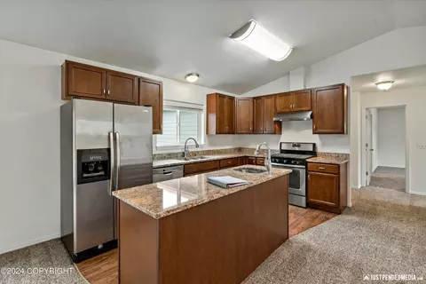 Kitchen - 11707 Aurora St # 2, Eagle River, AK 99577 photo 1 of 4