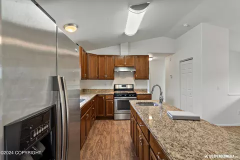 Kitchen - 11707 Aurora St # 2, Eagle River, AK 99577 photo 3 of 4