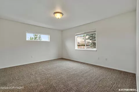 Bedroom - 11707 Aurora St # 2, Eagle River, AK 99577 photo 2 of 3