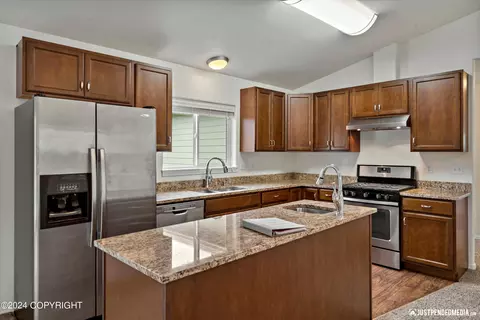 Kitchen - 11707 Aurora St # 2, Eagle River, AK 99577 photo 2 of 4