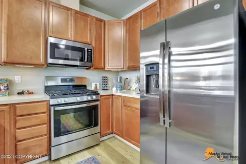 Kitchen - 12240 Vista Ridge Loop # 33, Eagle River, AK 99577 photo 3 of 5
