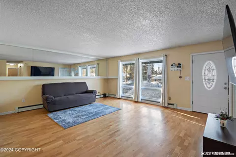 Living - 10231 Chandalar St, Eagle River, AK 99577 photo 1 of 2