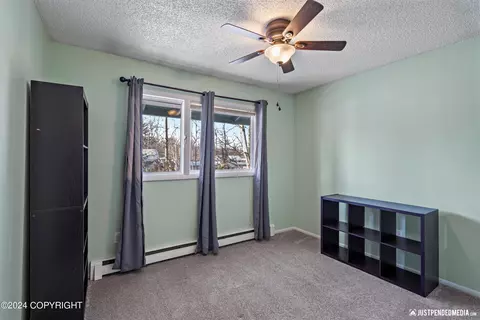 Bedroom - 10231 Chandalar St, Eagle River, AK 99577 photo 2 of 3
