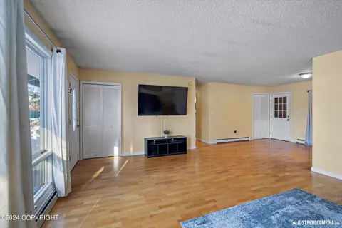 Living - 10231 Chandalar St, Eagle River, AK 99577 photo 2 of 2