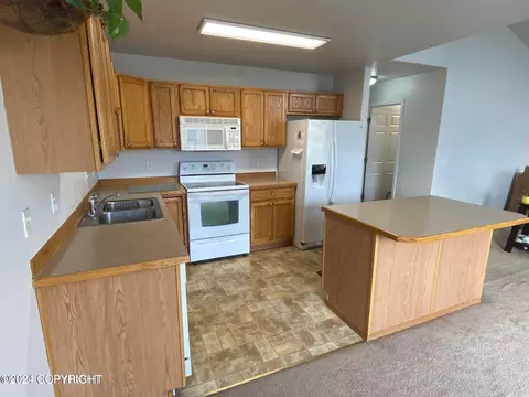 Kitchen - 1657 Mountainman Loop # 27, Anchorage, AK 99507 photo 1 of 2