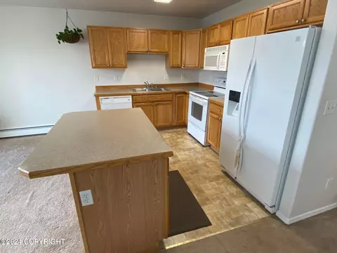 Kitchen - 1657 Mountainman Loop # 27, Anchorage, AK 99507 photo 2 of 2