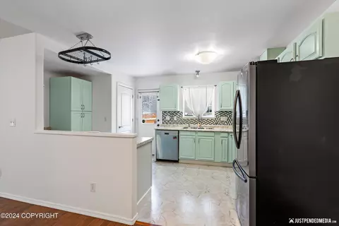 Kitchen - 5611 Alora Loop # 23, Anchorage, AK 99504 photo 1 of 3