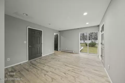 Living - 7827 Stanley Dr, Anchorage, AK 99518 photo 8 of 11