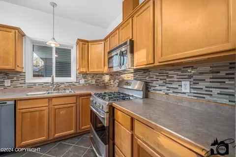 Kitchen - 5874 Big Bend Loop, Anchorage, AK 99502 photo 2 of 3