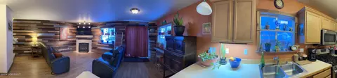 Living - 11061 Hannah Jane Pl # 2, Eagle River, AK 99577 photo 1 of 9