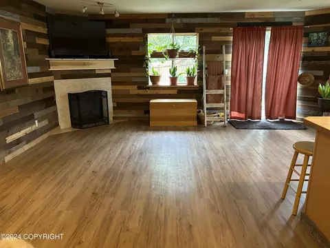 Living - 11061 Hannah Jane Pl # 2, Eagle River, AK 99577 photo 8 of 9