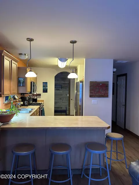 Kitchen - 11061 Hannah Jane Pl # 2, Eagle River, AK 99577 photo 4 of 12