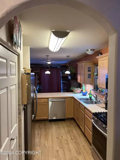 Kitchen - 11061 Hannah Jane Pl # 2, Eagle River, AK 99577 photo 7 of 12