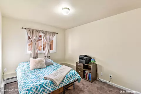 Bedroom - 18830 S Kanaga Loop, Eagle River, AK 99577 photo 5 of 6