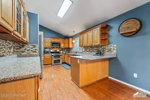 Kitchen - 19721 Revilla Cir, Eagle River, AK 99577 photo 1 of 9