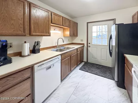 Kitchen - 10212 Thimble Berry Dr, Anchorage, AK 99515 photo 3 of 4