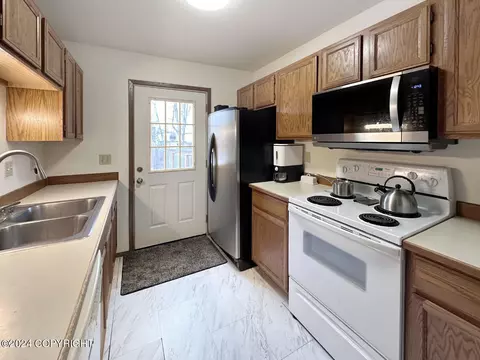 Kitchen - 10212 Thimble Berry Dr, Anchorage, AK 99515 photo 4 of 4