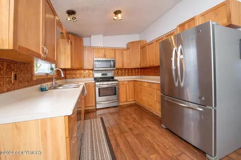 Kitchen - 3930 Checkmate Dr, Anchorage, AK 99508 photo 2 of 4