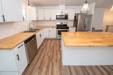 Kitchen - 208 E 23rd Ave, Anchorage, AK 99503 photo 4 of 9
