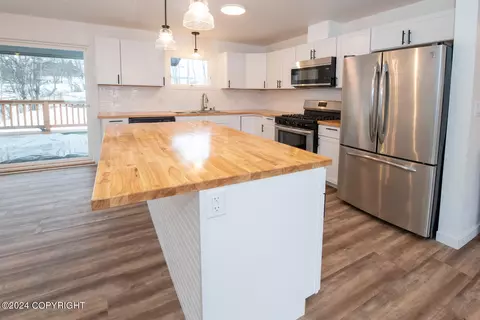 Kitchen - 208 E 23rd Ave, Anchorage, AK 99503 photo 2 of 9