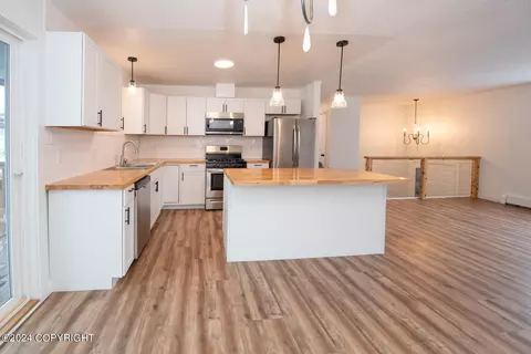 Kitchen - 208 E 23rd Ave, Anchorage, AK 99503 photo 3 of 9