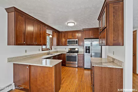 Kitchen - 19635 War Admiral Rd, Eagle River, AK 99577 photo 4 of 5