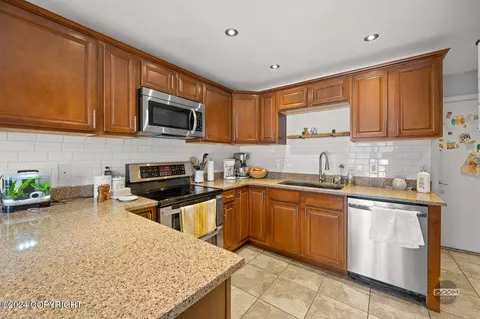 Kitchen - 1007 W 80th Ave, Anchorage, AK 99518 photo 1 of 2