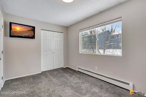 Bedroom - 9220 Glenn Haven Dr # E-4, Anchorage, AK 99502 photo 3 of 3