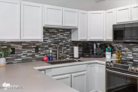 Kitchen - 5820 Sapphire Loop # 42A, Anchorage, AK 99504 photo 2 of 3