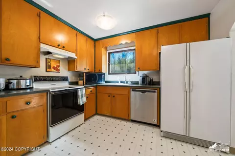 Kitchen - 11121 Forest Dr, Anchorage, AK 99516 photo 3 of 7