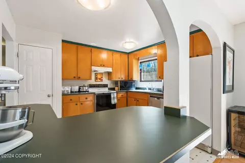Kitchen - 11121 Forest Dr, Anchorage, AK 99516 photo 1 of 7