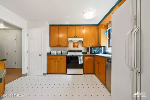 Kitchen - 11121 Forest Dr, Anchorage, AK 99516 photo 2 of 7