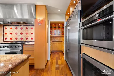 Kitchen - 7080 E Tree Ct, Anchorage, AK 99507 photo 3 of 12