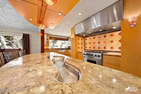 Kitchen - 7080 E Tree Ct, Anchorage, AK 99507 photo 2 of 12