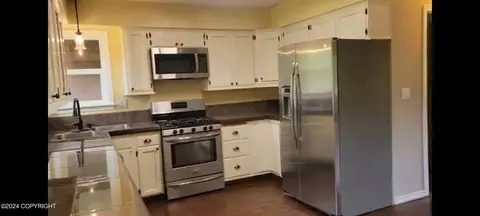 Kitchen - 39902 Olivia St, Kenai, AK 99611 photo 3 of 7