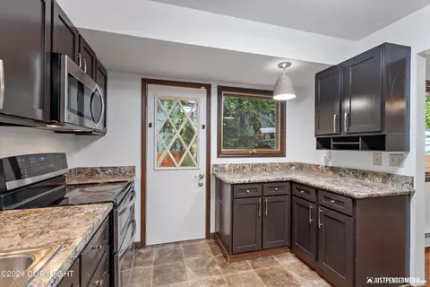 Kitchen - 13701 Capstan Dr, Anchorage, AK 99516 photo 3 of 4