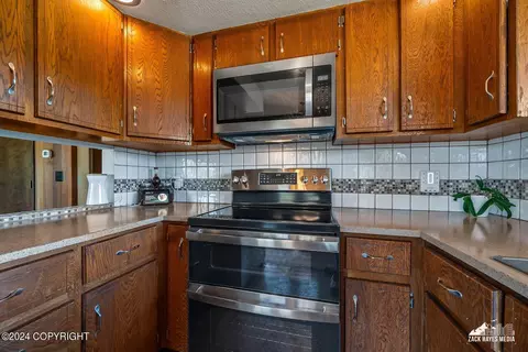 Kitchen - 5040 E 98th Ave, Anchorage, AK 99507 photo 2 of 2